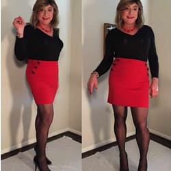Black top and red skirt with buttons