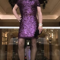 love me a purple sequin dress in a luxury hotel