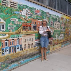 In front of the Littleton, Colorado mural