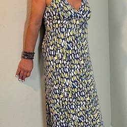 Wearing a maxi dress while standing upright