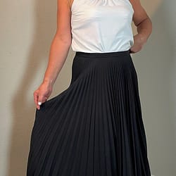 Pleated skirt paired with cami top