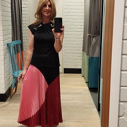 Trying on a skirt in my favourite dress shop