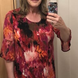 They say that when a girl is feeling down, she should go buy herself something pretty. Everyone has been asking me if I ever wear a dress, so I found a very pretty dress and it fits me like a glove. I do feel better now. Here’s me in my new dress.