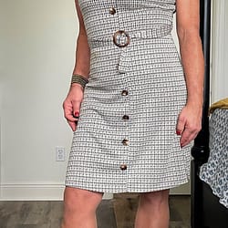 Standing in houndstooth dress with longer hair and brown heels (1 of 2)