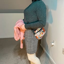 Without sweater and added purse.