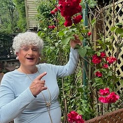 Granny showing off her roses at Aunty’s wedding
