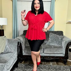 Black skirt red blouse and pumps