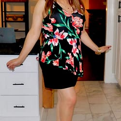 Floral top with black skirt and flats