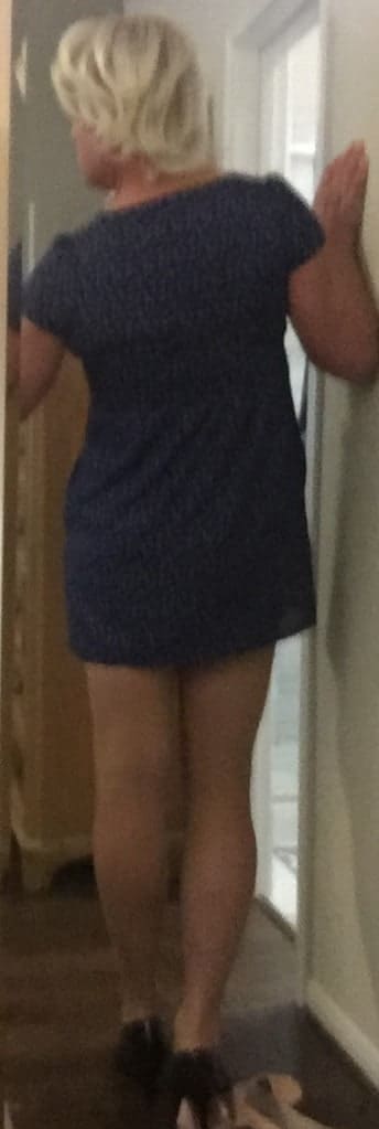 Fuzzy mirror selfie in blue dress