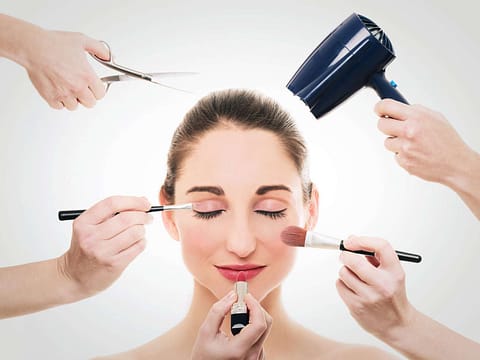 Pretty woman doing makeup