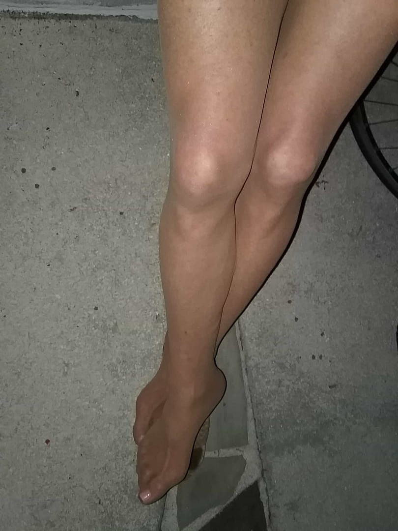 Smooth shaved legs in sheer pantyhose